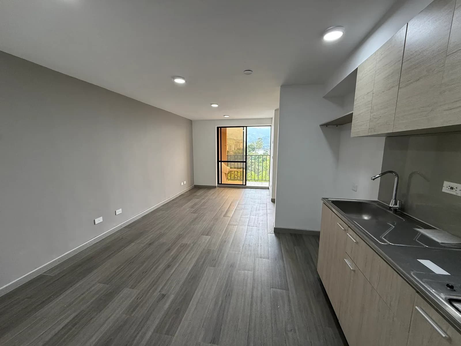 Actual photograph of the Hito 18 apartment’s living room and kitchen